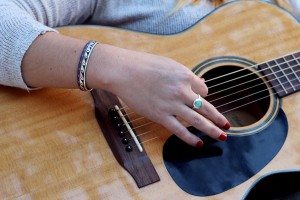 Davis often plays guitar at her home in San Rafael. Photo by Molly Oleson