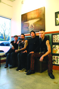 The artistic four, who merge their talents at The Forge Tattoo. Photo by Molly Oleson.