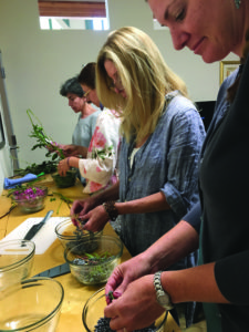 Women at Gathering Thyme prepare medicine made from nature. Photo courtesy of Gathering Thyme.