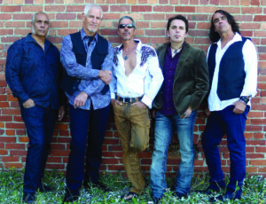 The CORE, a five-member band with a large repertoire, learns new songs all of the time to please their clients (Martinez is second from right). Photo courtesy of The CORE.