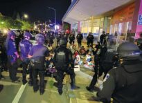 More than 100 curfew violators placed in unsafe holding conditions