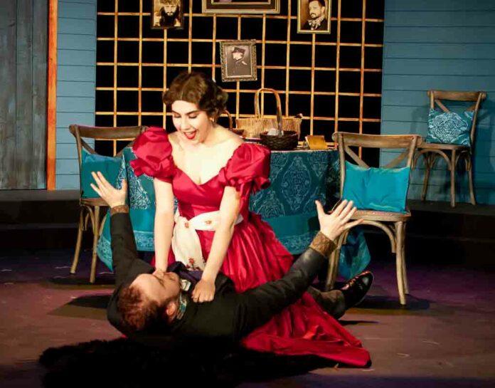 Photo by Robin Jackson FLOORED Hunter Candrian-Velez as ‘Marya’ floors Michel B. Harris as ‘Hlestekov.’