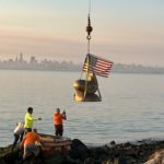 Sausalito sea lion sculpture lifted by crane to reinstall