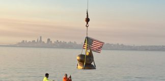 Sausalito sea lion sculpture lifted by crane to reinstall
