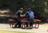 A chaplain from The Street Chaplaincy in Marin offers spiritual support to a homeless person in San Rafael.