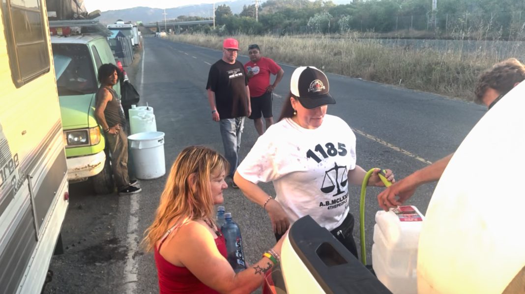 Water deliver to homeless encampment