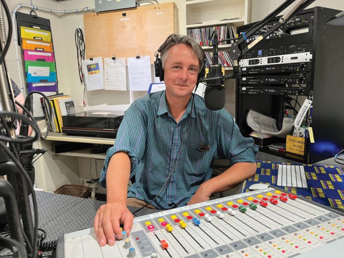 KWMR program director, Jeff Manson, on the air in the West Marin studio.