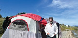 When the Pacific Sun last reported on Sean Derning, Marin County had seized the converted bus he lived in on Binford Road and temporarily put him up in a motel. Now, he’s back on Binford, this time in a tent.