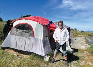 When the Pacific Sun last reported on Sean Derning, Marin County had seized the converted bus he lived in on Binford Road and temporarily put him up in a motel. Now, he’s back on Binford, this time in a tent.