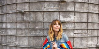 Molly Tuttle is on the road, performing cuts from her latest album, So Long Little Miss Sunshine—a mixture of country and pop that marks a departure from the genre for which she’s generally known. 
