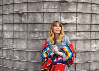 Molly Tuttle is on the road, performing cuts from her latest album, So Long Little Miss Sunshine—a mixture of country and pop that marks a departure from the genre for which she’s generally known. 
