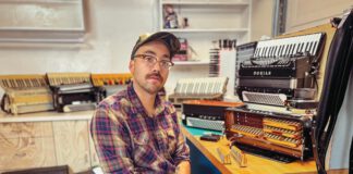 Conceptually, the accordion is quite ingenious, consisting of one set of piano keys and one set of buttons blocking reeds and forming chords on each of two banks of “harmonicas” held between a billows, sucking and compressing a captive wind.