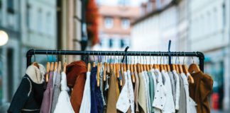 Children's clothing on display at a community clothing swap promoting free exchanges and sustainable reuse in Point Reyes Station.