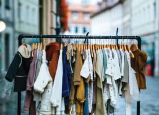 Children's clothing on display at a community clothing swap promoting free exchanges and sustainable reuse in Point Reyes Station.