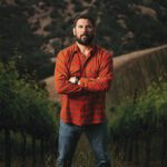 Clay Mauritson in a vineyard