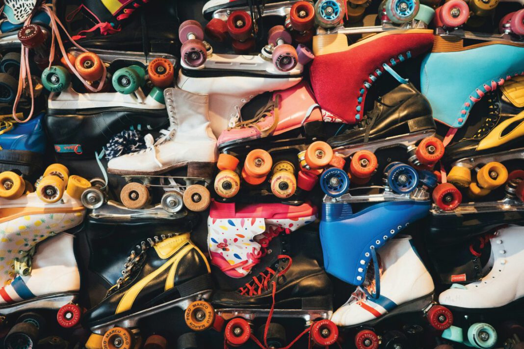 A group of roller skates arranged together.