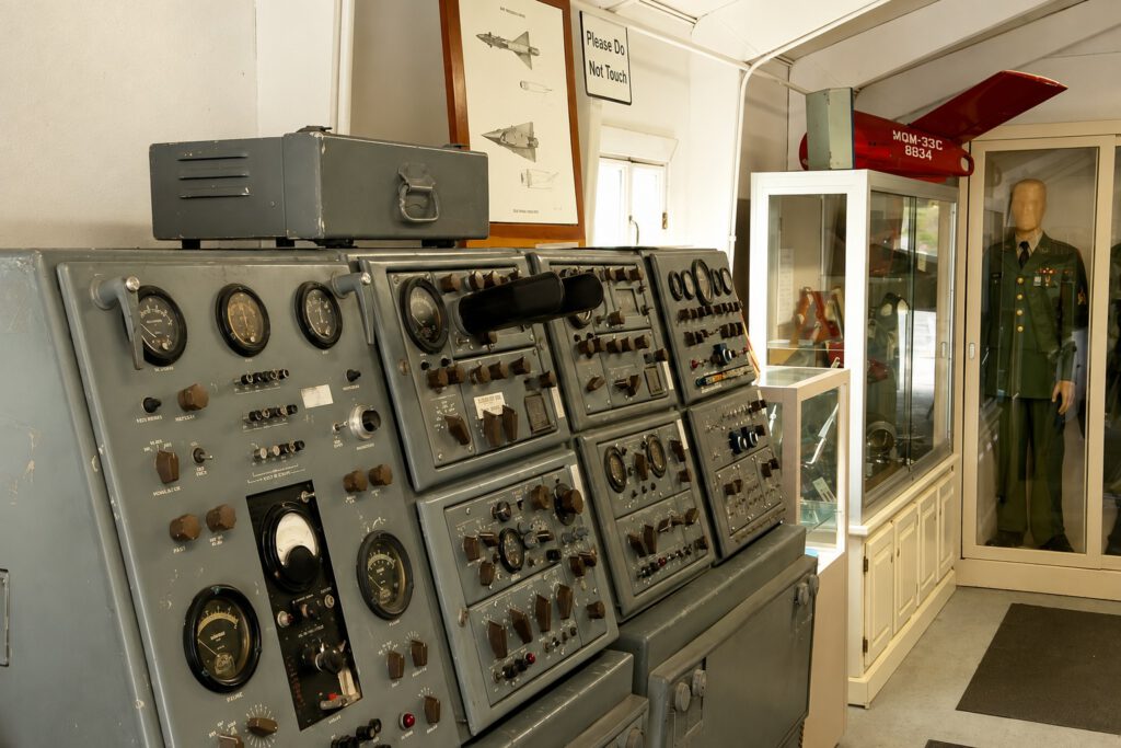 Vintage radar and control console equipment on display inside a former Nike missile site building 